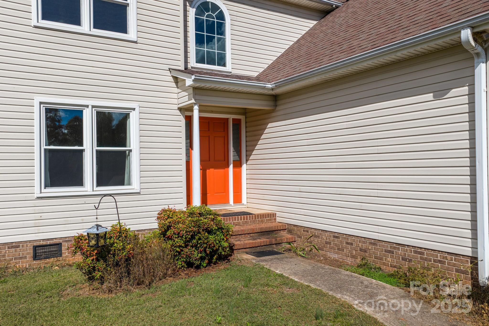 712 Painted Feather Lane Conover, NC 28613 - Photo 34 of 48 a view of a house with a yard and sitting space
