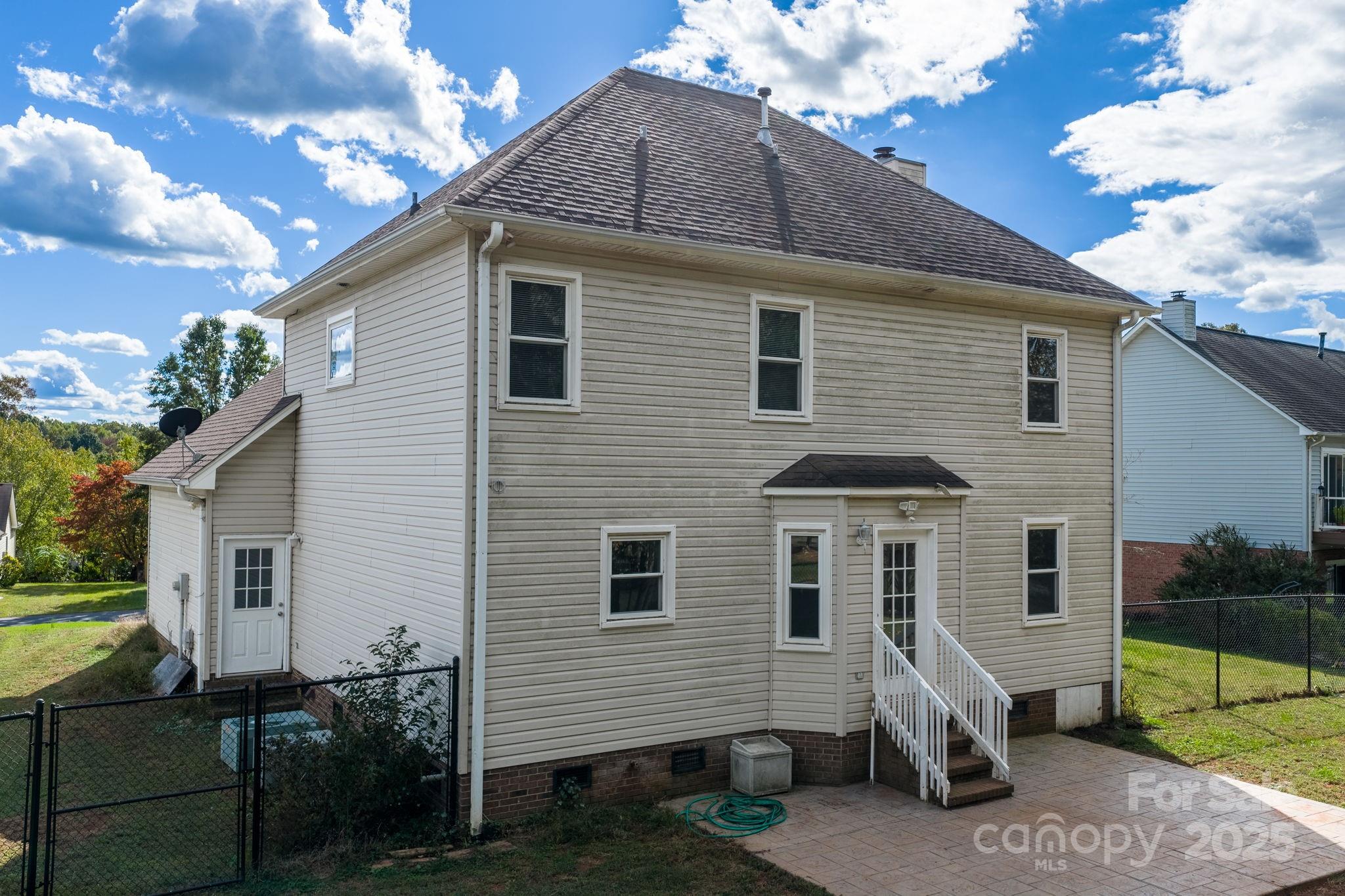 712 Painted Feather Lane Conover, NC 28613 - Photo 42 of 48 a front view of a house with a yard