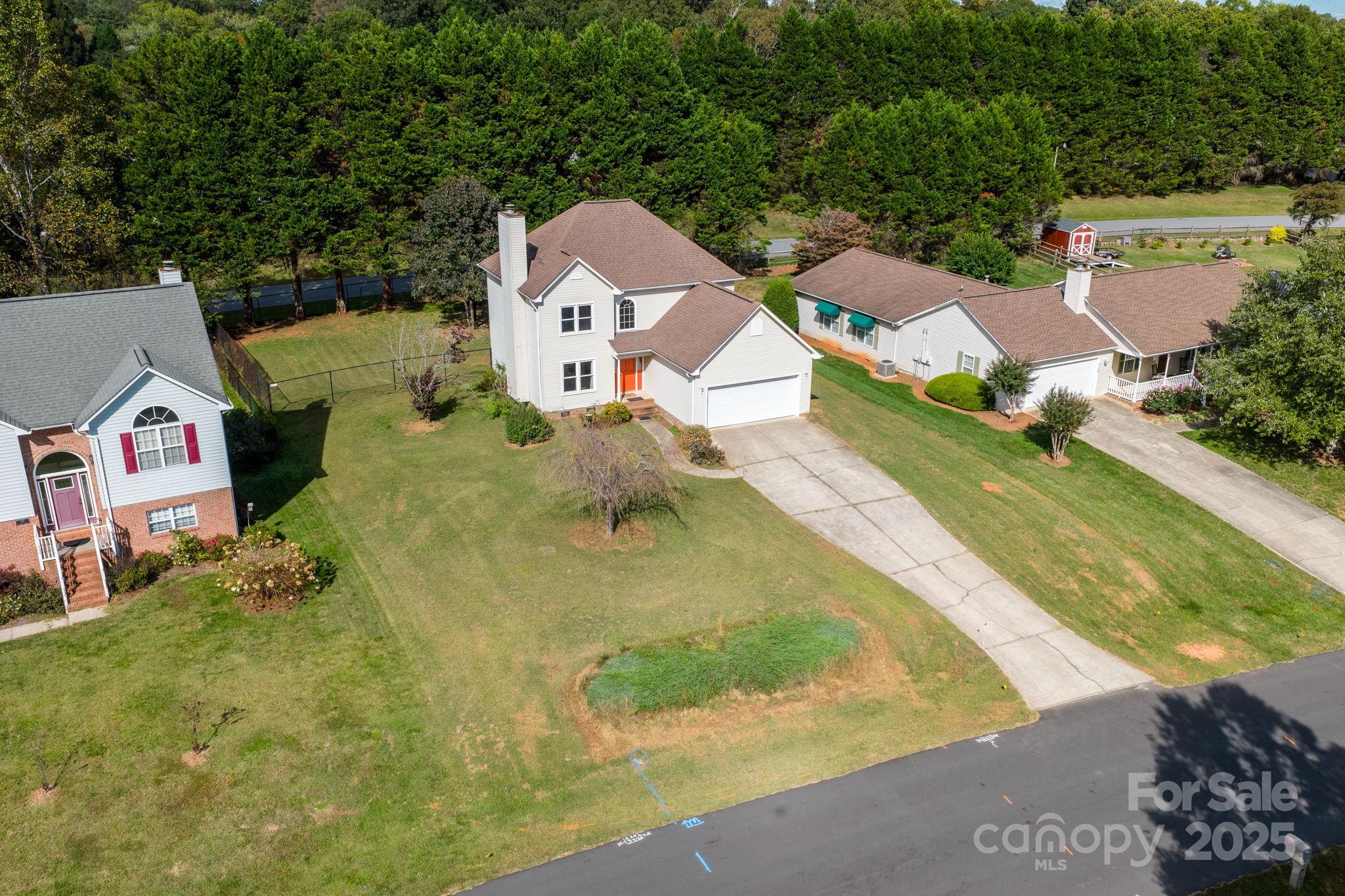 712 Painted Feather Lane Conover, NC 28613 - Photo 46 of 48 an aerial view of residential houses with yard