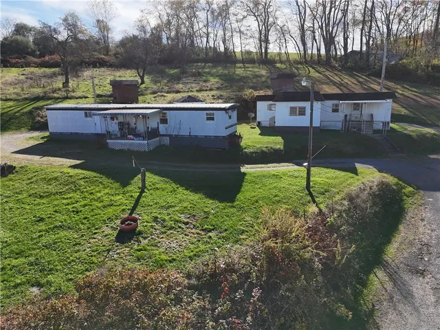 a view of a garden with a lake