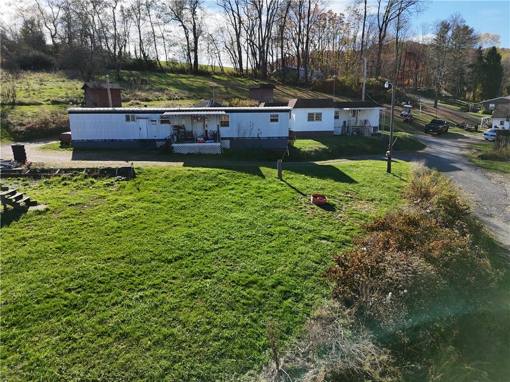122 Cemetery Road Kittanning, PA 16201 - Photo 7 of 10 a view of a garden with a bench