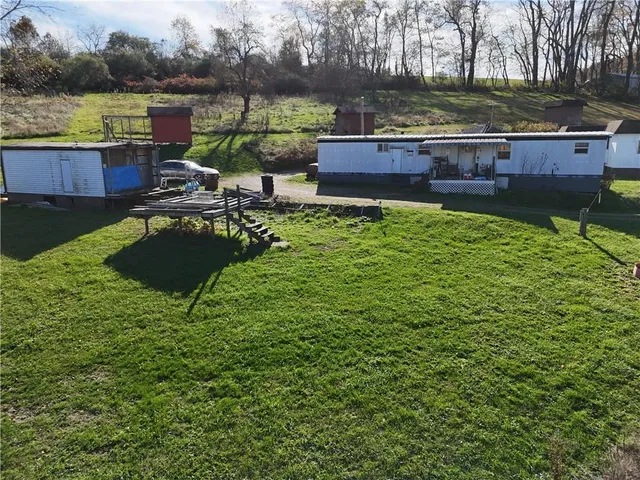 a view of a garden with lake view