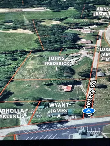 a view of a yard with an outdoor seating