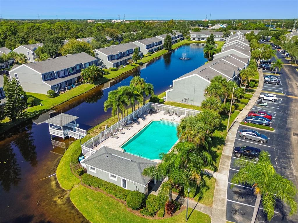 382 Countryside Key Boulevard Oldsmar, FL 34677 - Photo 49 of 58 an aerial view of residential houses with outdoor space and swimming pool
