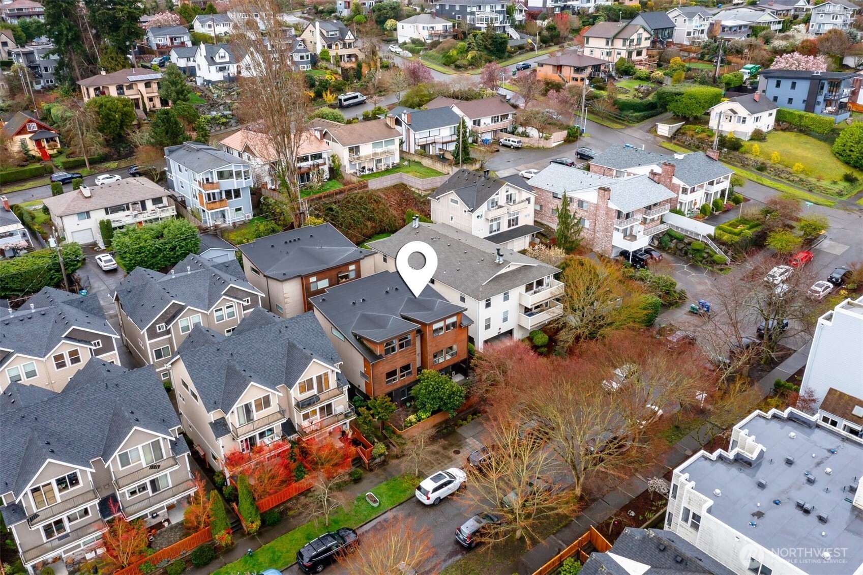 6536 42nd Avenue Southwest, Unit B Seattle, WA 98136 - Photo 27 of 27 an aerial view of a city with lots of residential buildings