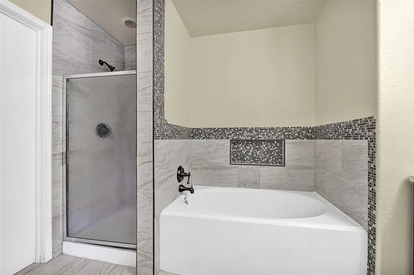 a bathroom with a bathtub