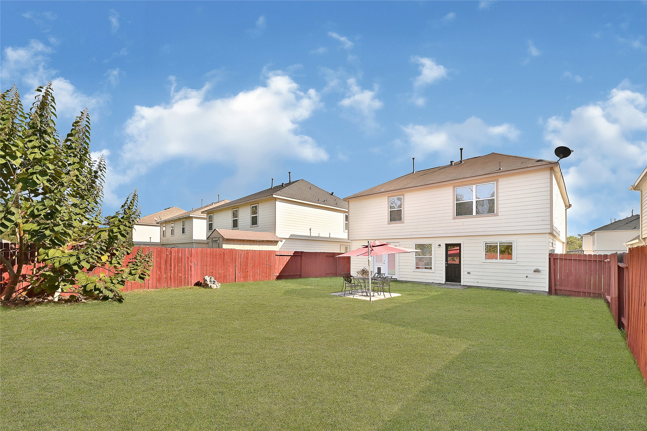 16107 Sheldon Ridge Way Houston, TX 77044 - Photo 26 of 27 a front view of house with an outdoor space and seating