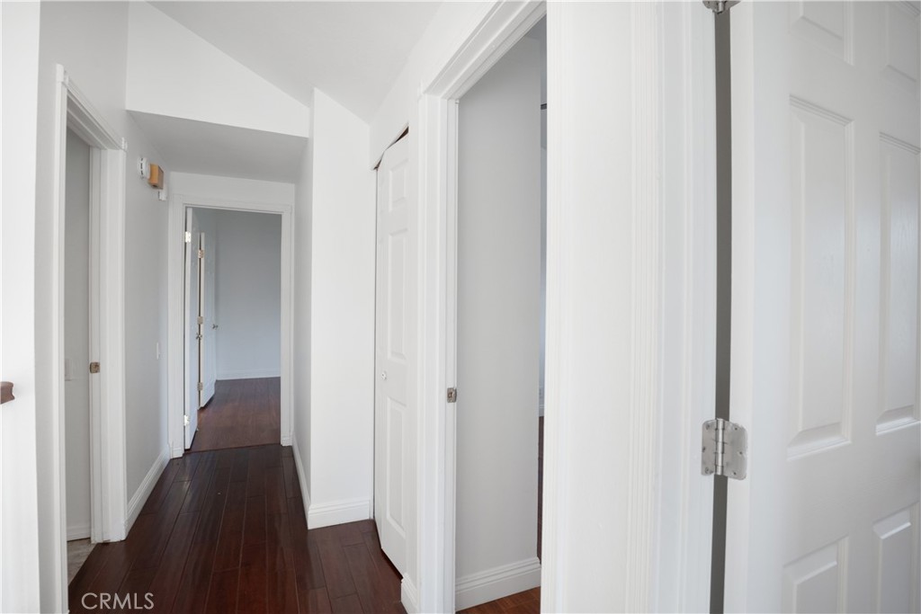 6 Sanderling Irvine, CA 92604 - Photo 18 of 35 a view of a hallway with a wooden floor