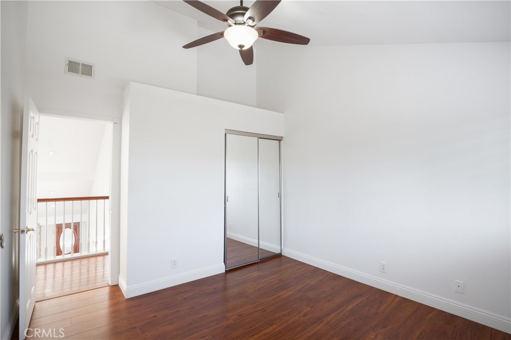 6 Sanderling Irvine, CA 92604 - Photo 22 of 35 an empty room with wooden floor closet and windows
