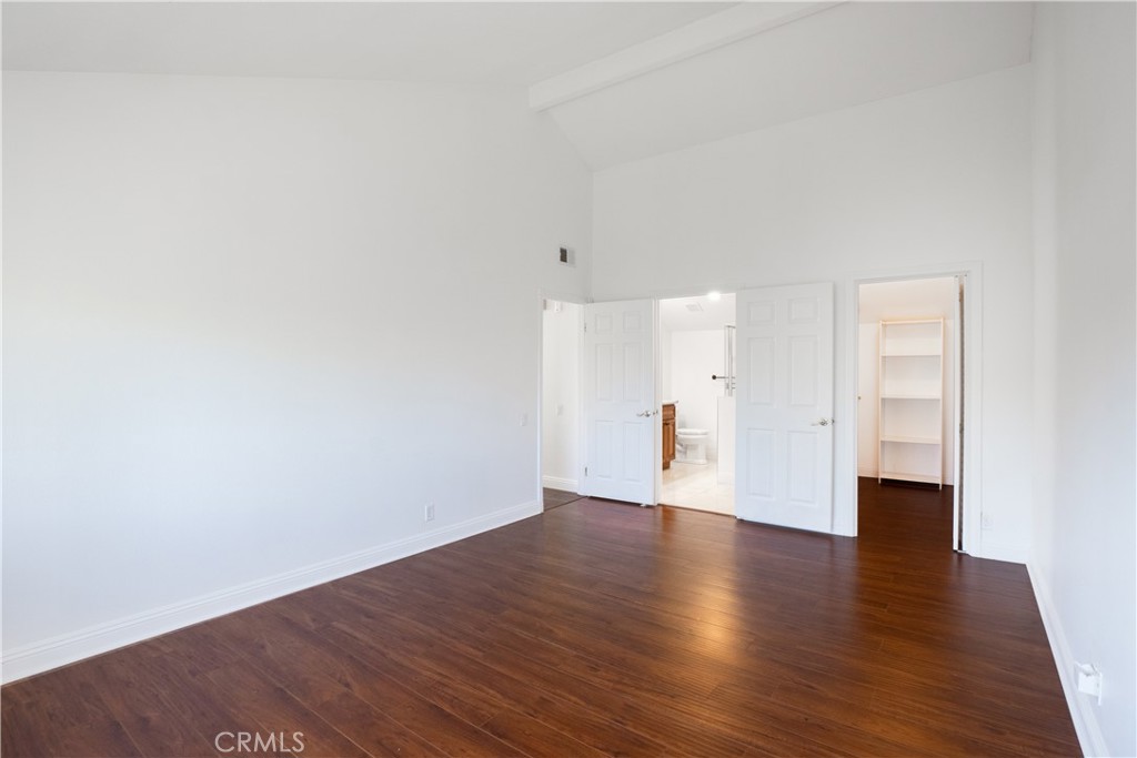 6 Sanderling Irvine, CA 92604 - Photo 25 of 35 a view of an empty room with wooden floor