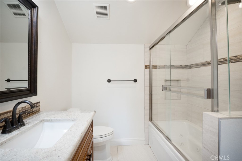 6 Sanderling Irvine, CA 92604 - Photo 28 of 35 a bathroom with a sink toilet and shower