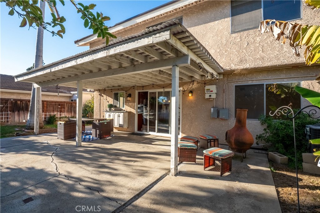 6 Sanderling Irvine, CA 92604 - Photo 31 of 35 a building outdoor space with patio furniture and potted plants