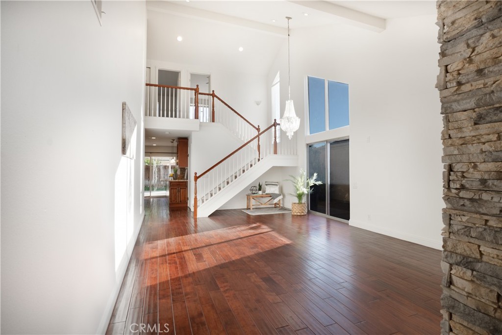 6 Sanderling Irvine, CA 92604 - Photo 4 of 35 a view of entryway and hall with wooden floor