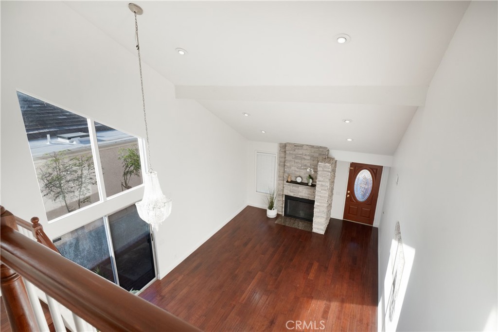 6 Sanderling Irvine, CA 92604 - Photo 7 of 35 a view of a living room with furniture and wooden floor