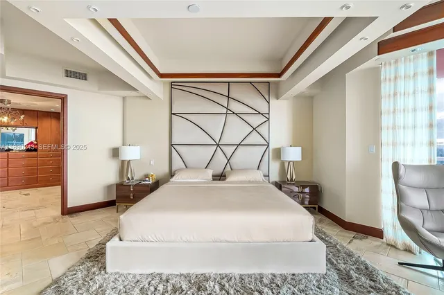 a bathroom with a tub and shower