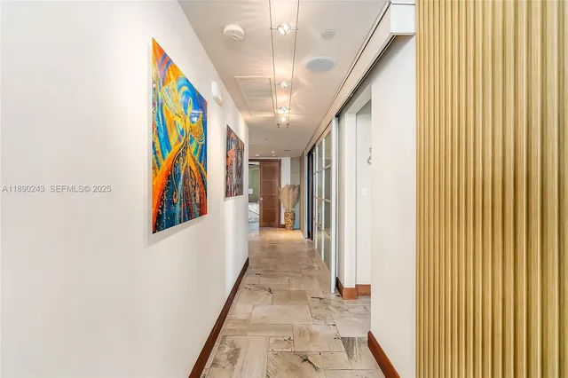 a large en suite bathroom with a double vanity sink and mirror