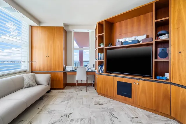 a view of balcony with furniture