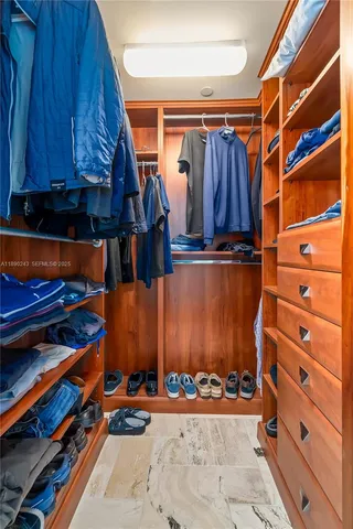 a view of swimming pool with outdoor seating and plants