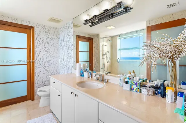 a swimming pool with outdoor seating and yard