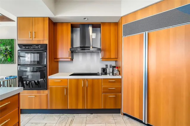 a kitchen with a sink and counter space