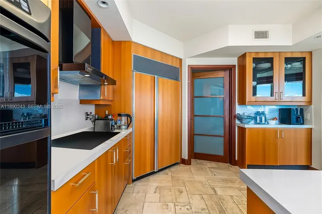 a living room with furniture and windows