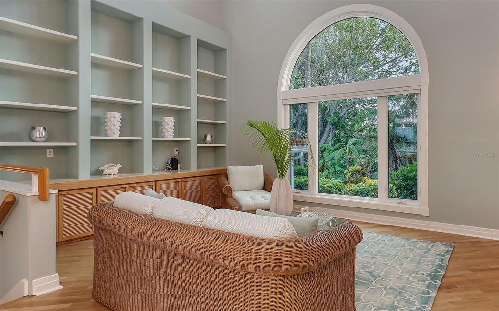 585 Gunwale Lane Longboat Key, FL 34228 - Photo 18 of 73 a living room with furniture and a large window