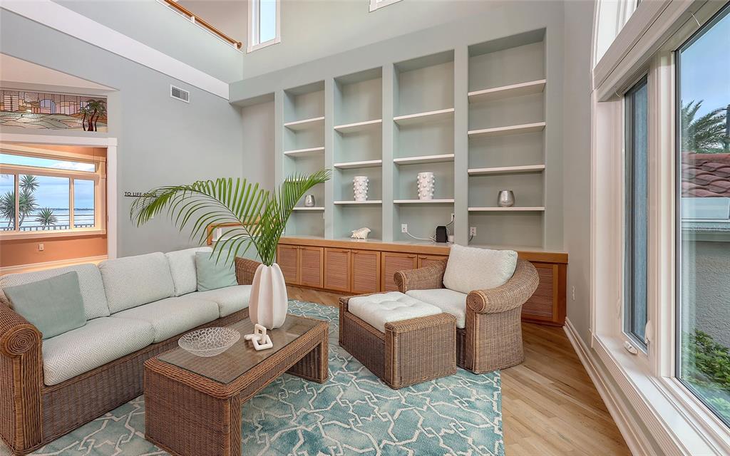 585 Gunwale Lane Longboat Key, FL 34228 - Photo 19 of 73 a living room with furniture and a window