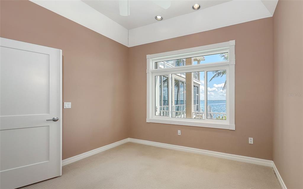 585 Gunwale Lane Longboat Key, FL 34228 - Photo 20 of 73 an empty room with a window