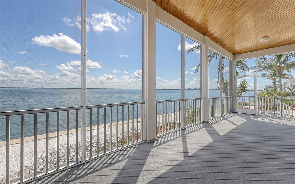 585 Gunwale Lane Longboat Key, FL 34228 - Photo 33 of 73 a view of a balcony with wooden floor