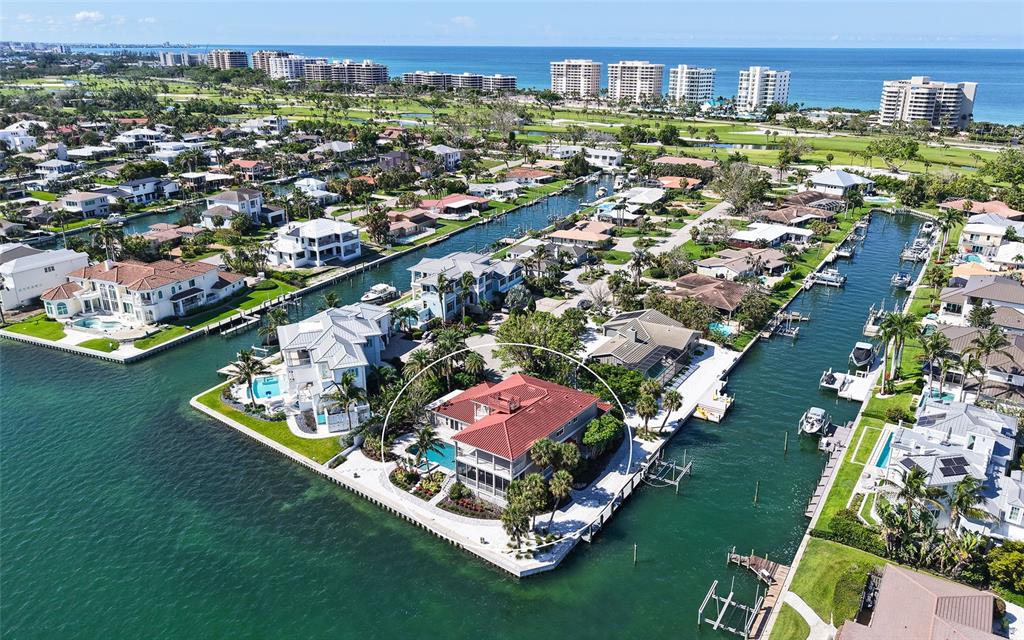 585 Gunwale Lane Longboat Key, FL 34228 - Photo 4 of 73 an aerial view of a house with a swimming pool yard and outdoor seating