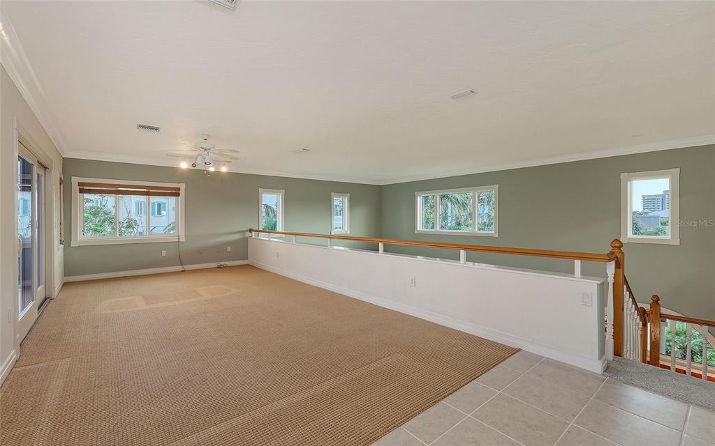 585 Gunwale Lane Longboat Key, FL 34228 - Photo 41 of 73 a view of an empty room with a window