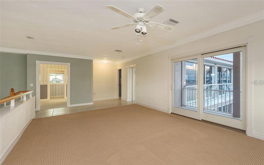 585 Gunwale Lane Longboat Key, FL 34228 - Photo 43 of 73 a view of an empty room with a window