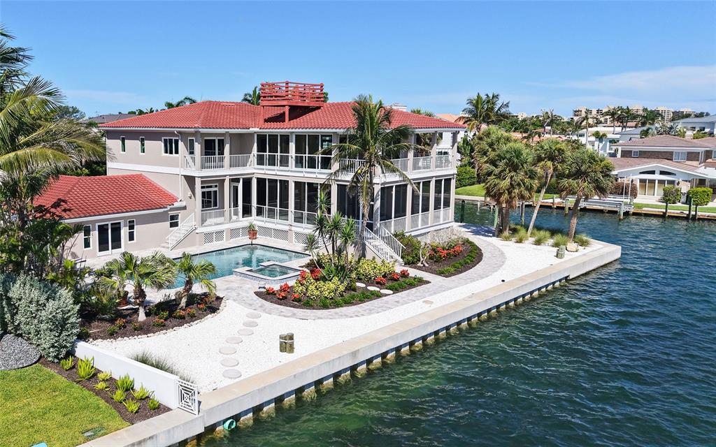 585 Gunwale Lane Longboat Key, FL 34228 - Photo 6 of 73 a view of a house with a yard