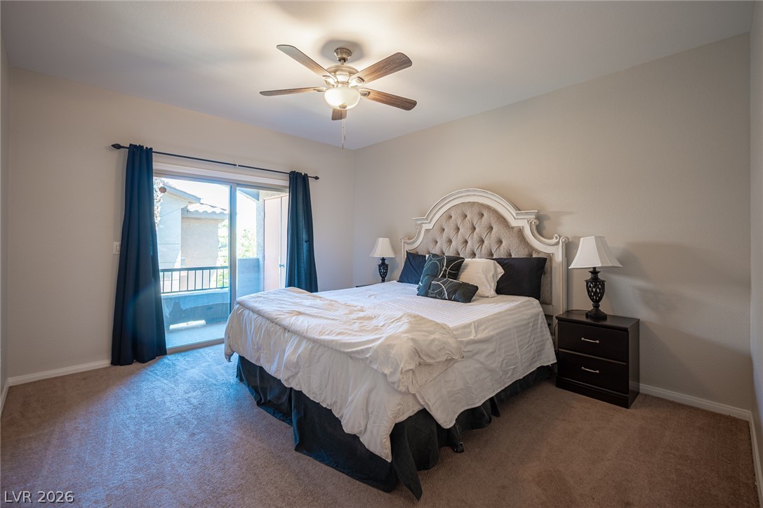 7701 West Robindale Road, Unit 274 Las Vegas, NV 89113 - Photo 28 of 38 This inviting bedroom features a private balcony and soft carpeting.