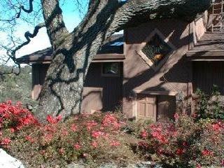 120 Oak Ridge Road San Rafael, CA 94903 - Photo 2 of 8 a front view of a house with lots of flowers