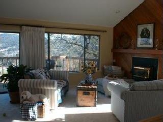 120 Oak Ridge Road San Rafael, CA 94903 - Photo 4 of 8 a living room with furniture large window and flat screen tv