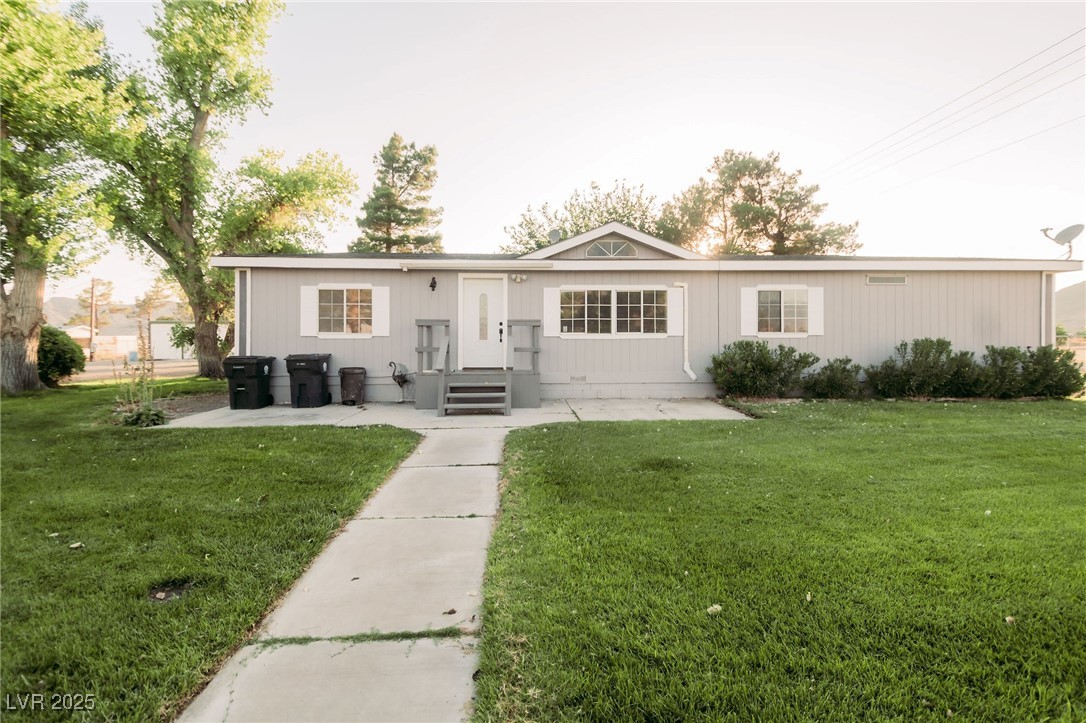3485 Gally Road Pahrump, NV 89060 - Photo 1 of 90 View of front of house featuring a front yard
