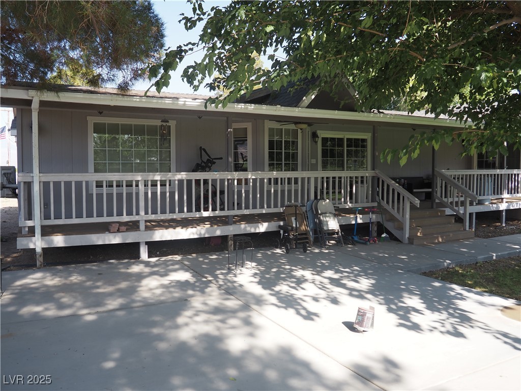 3485 Gally Road Pahrump, NV 89060 - Photo 23 of 90 View of front of home with a porch