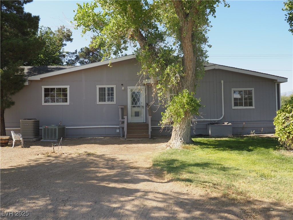 3485 Gally Road Pahrump, NV 89060 - Photo 37 of 90 Manufactured / mobile home featuring a front yard