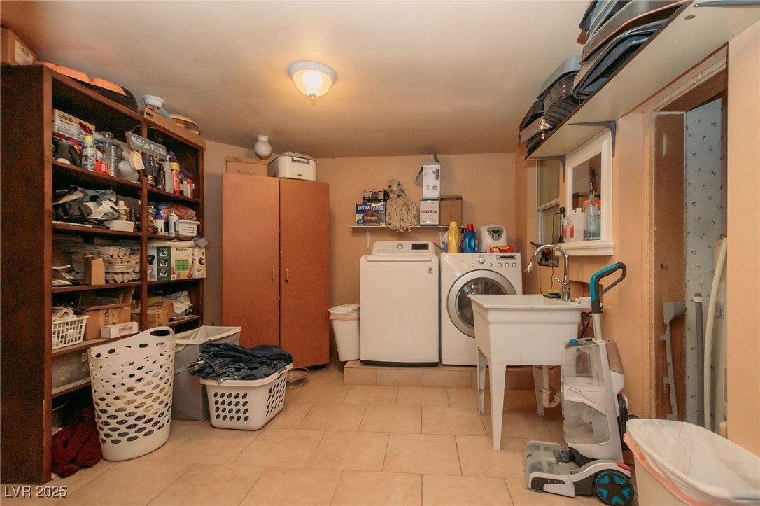3485 Gally Road Pahrump, NV 89060 - Photo 75 of 90 Washroom featuring tile patterned flooring and washer and dryer