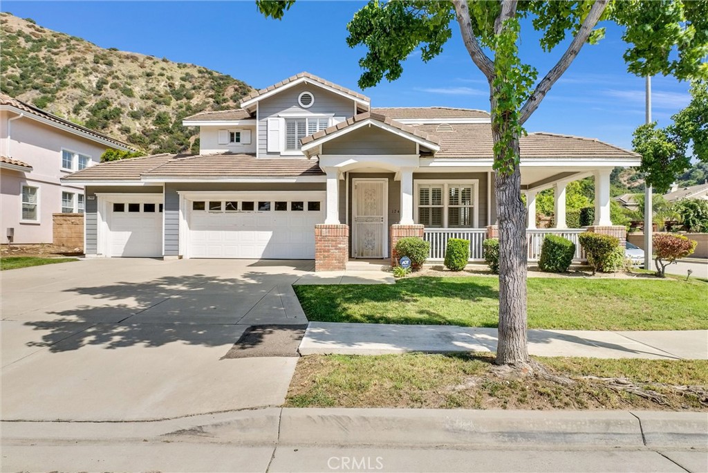 1748 Ranch Road Azusa, CA 91702 - Photo 1 of 1 a front view of a house with a yard