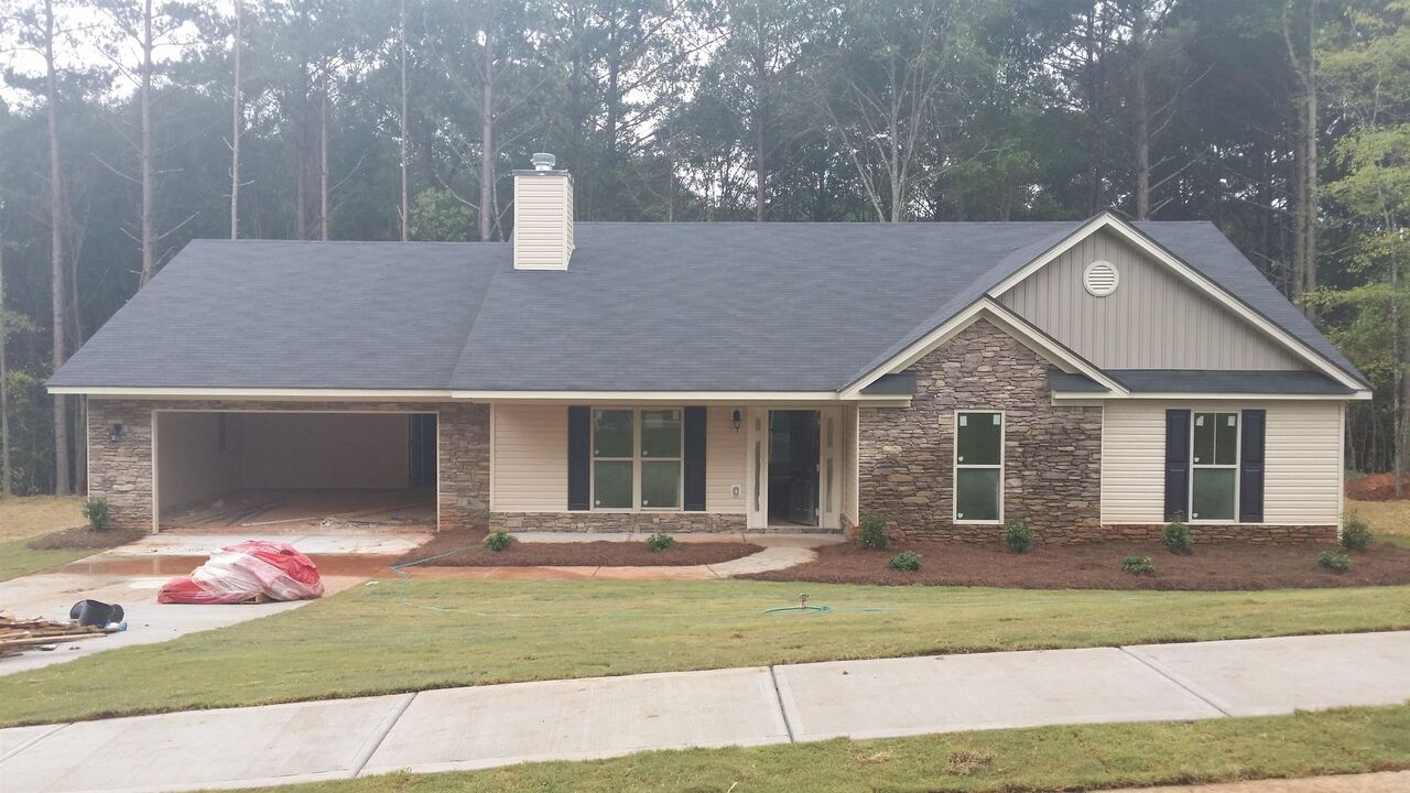 1227 Ernest Elder Road, Unit 2 Winder, GA 30680 - Photo 1 of 1 a front view of house with yard