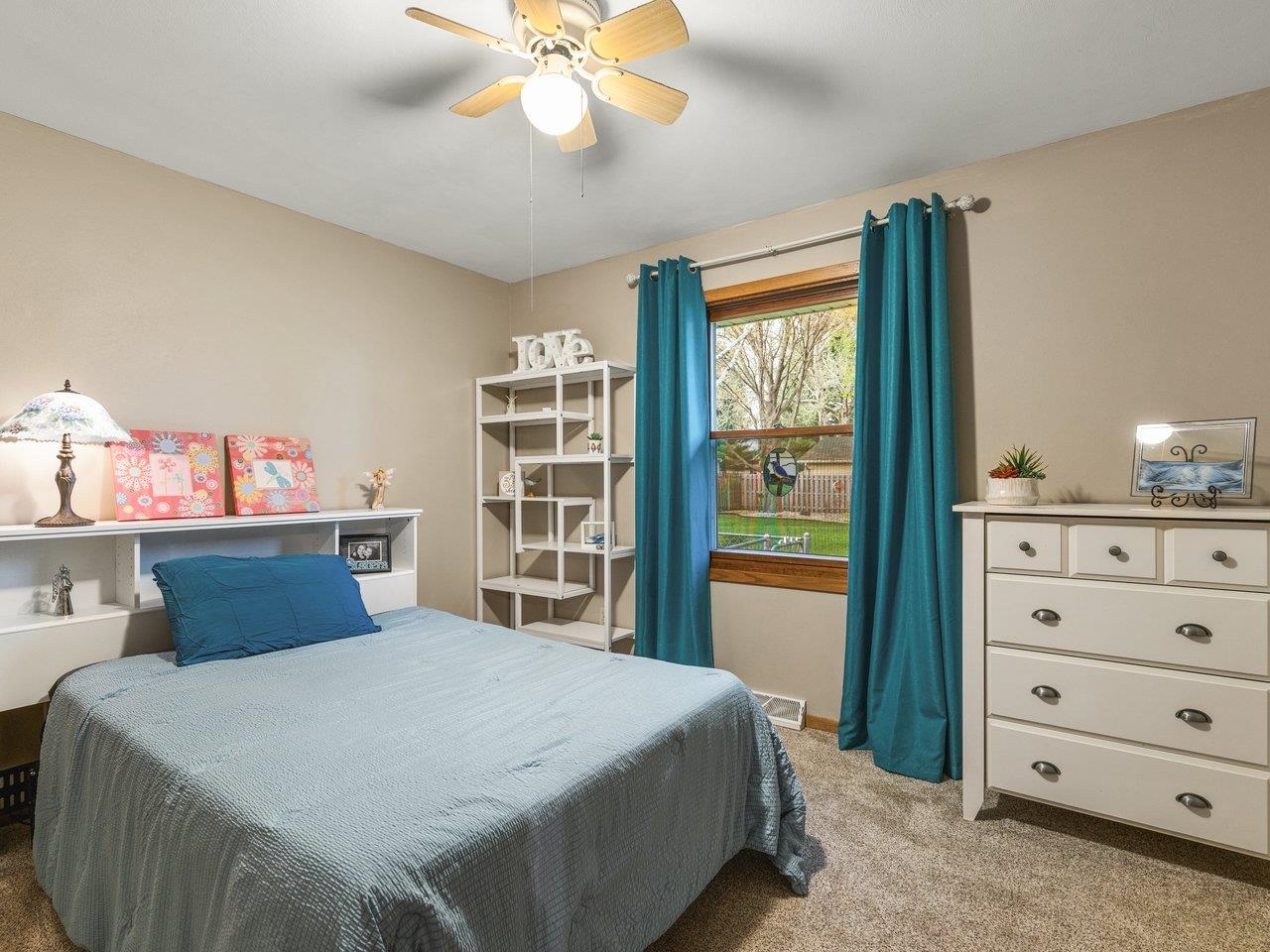 1816 Post Road Beloit, WI 53511 - Photo 22 of 42 a bedroom with a bed and a window