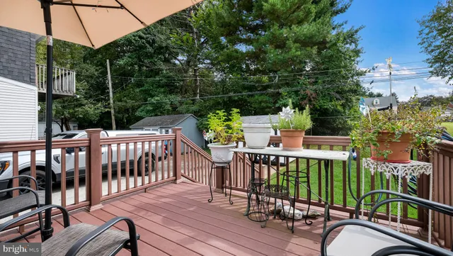 a view of a balcony with chairs
