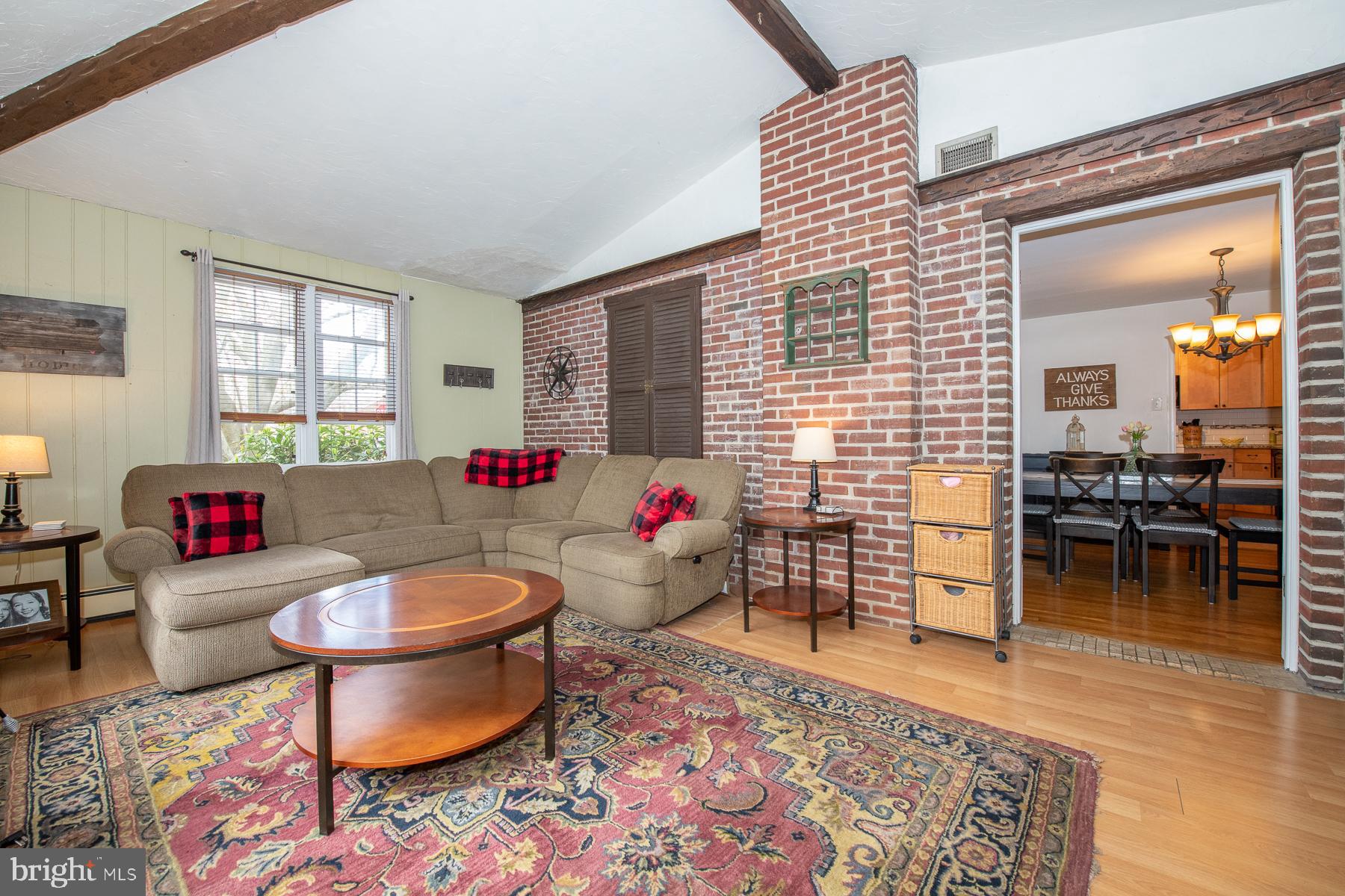 24 Holbrook Road Havertown, PA 19083 - Photo 12 of 40 Beamed ceiling and cool exposed brick wall
