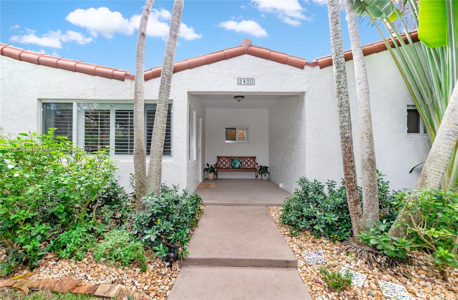2400 Trapp Avenue Miami, FL 33133 - Photo 1 of 47 a entryway to the house with potted plants