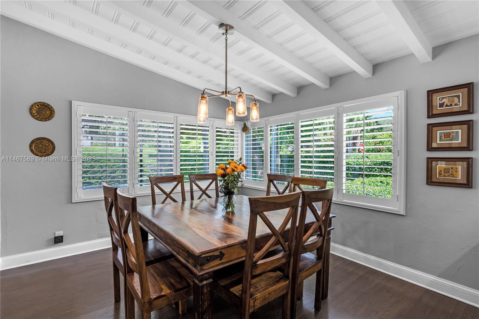 2400 Trapp Avenue Miami, FL 33133 - Photo 11 of 47 a view of a dining room with furniture window and outside view