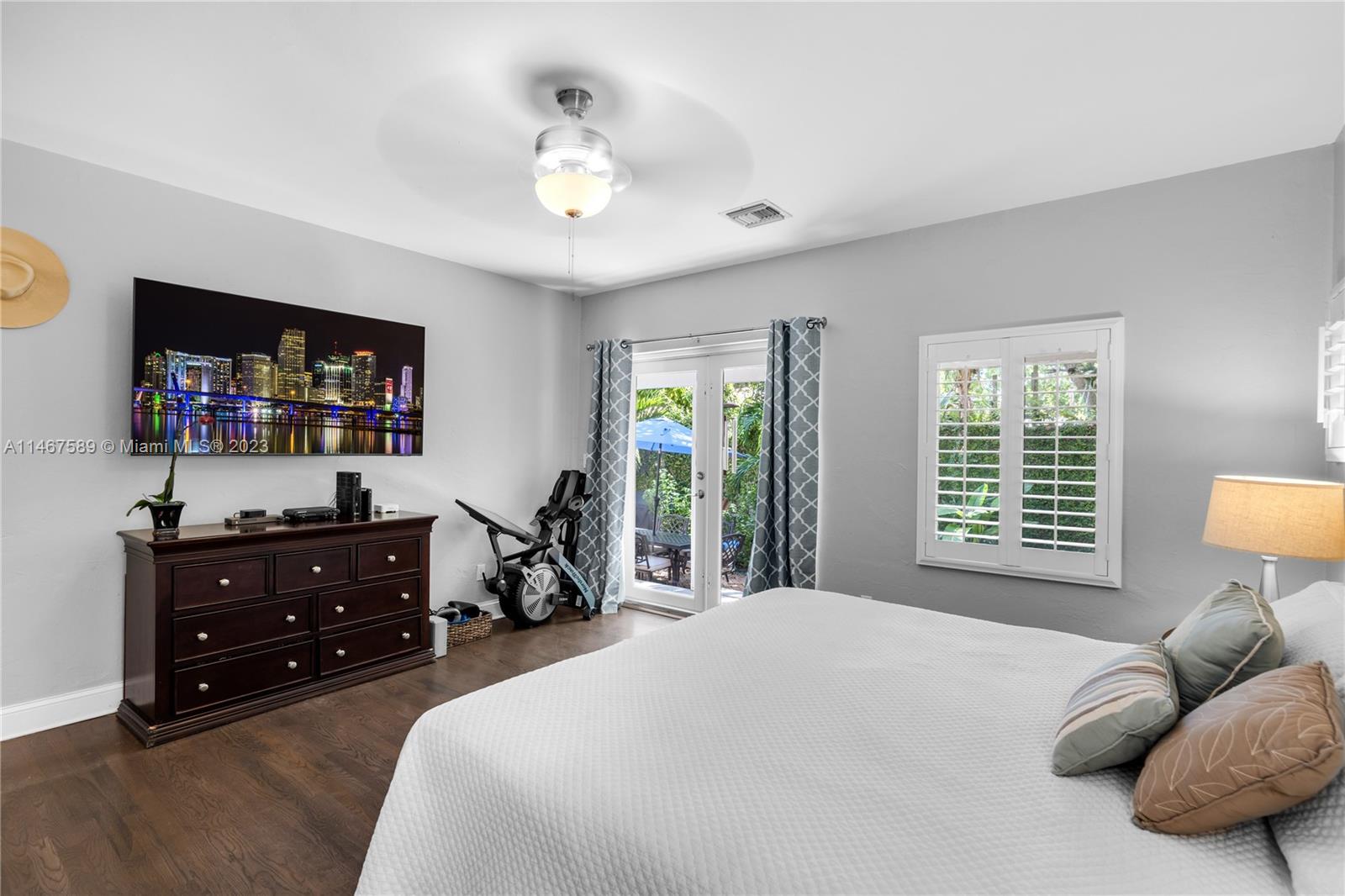 2400 Trapp Avenue Miami, FL 33133 - Photo 23 of 47 a bedroom with a bed and window