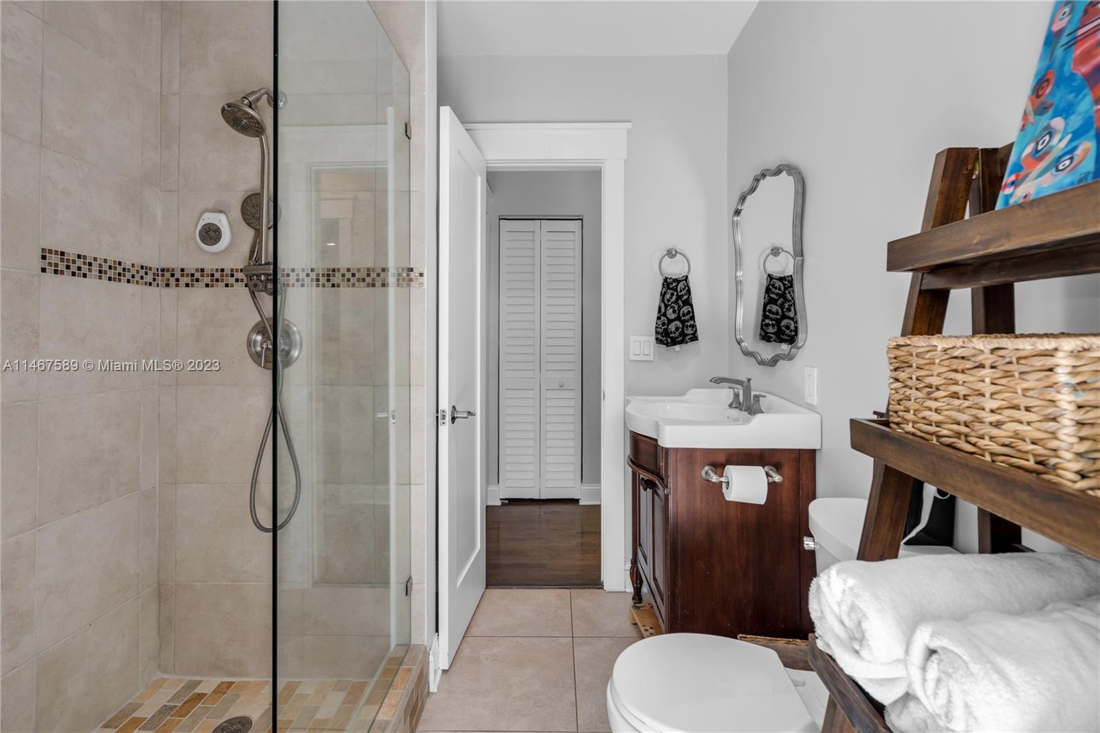 2400 Trapp Avenue Miami, FL 33133 - Photo 30 of 47 a bathroom with a sink toilet and shower