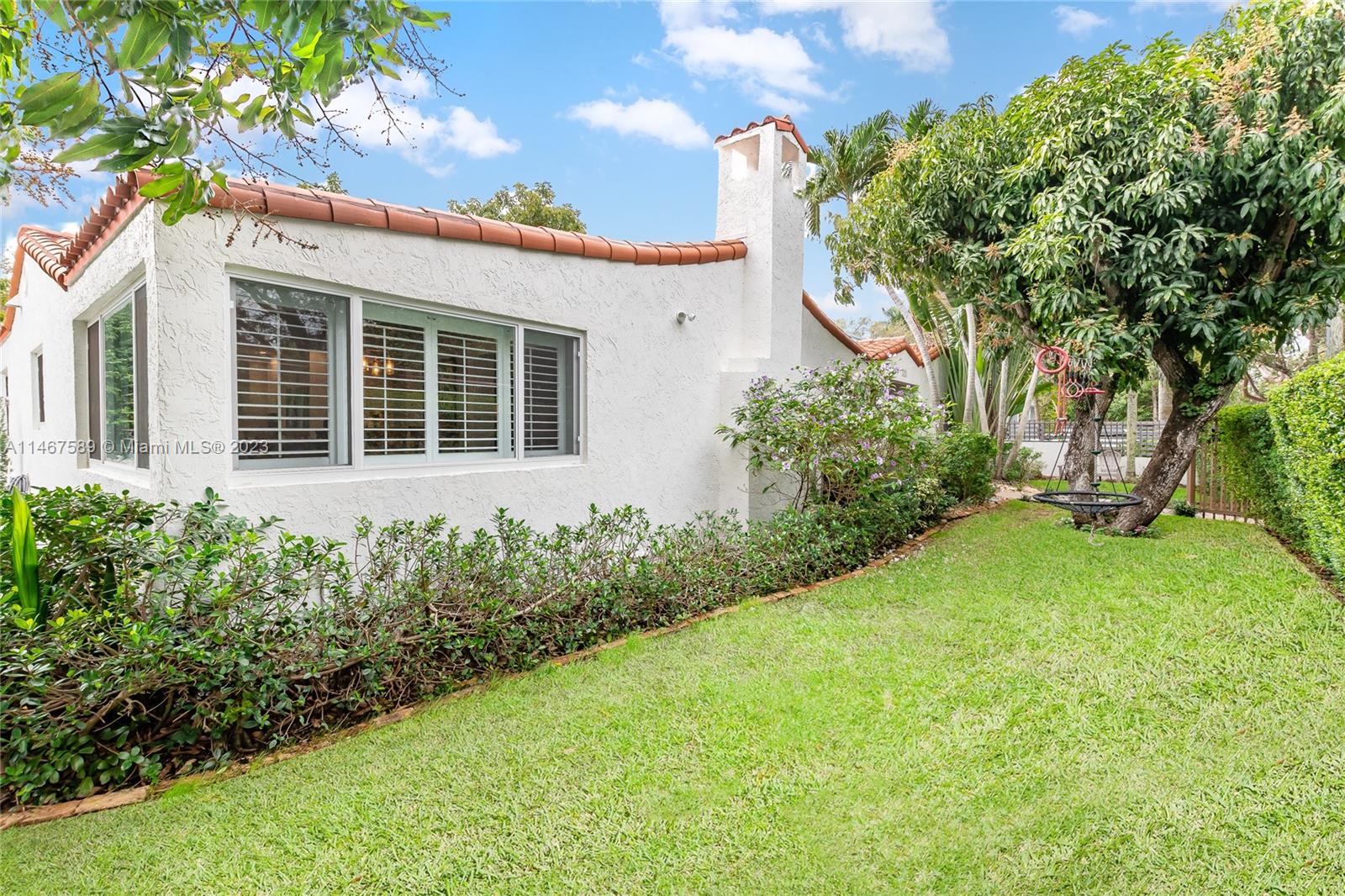 2400 Trapp Avenue Miami, FL 33133 - Photo 37 of 47 front view of a house with a yard